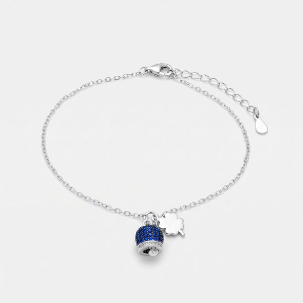 Bracciale in Argento 925 campanella portafortuna impreziosito da zirconi blu e quadrifoglio