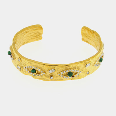 Semi-rigid steel bracelet embellished with green eyes