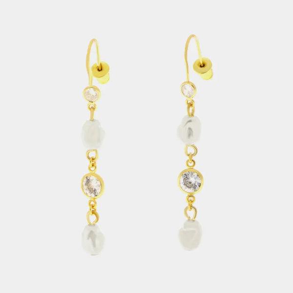 Metal earrings with white beads and crystal