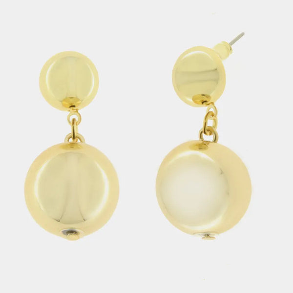 Metal earrings with shiny pearl pendant