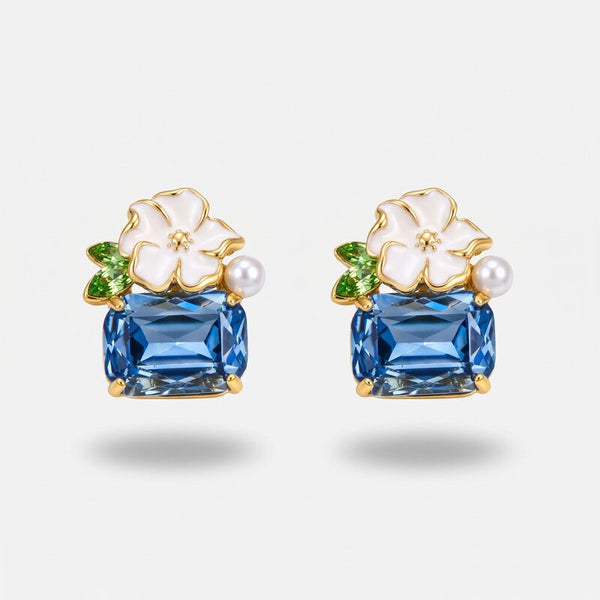 Orecchini in Metallo fiore bianco e cristallo azzurro Amo Venezia