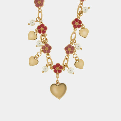 Metal necklace with pink flowers and hanging hearts