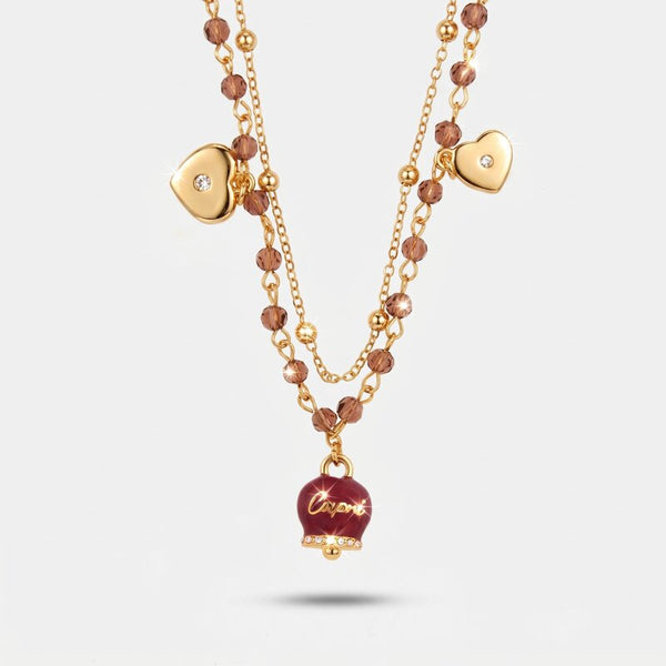 Collana in Metallo multifilo con campanella e pietre viola