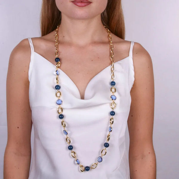 Metal necklace with chain and blue pearls and crystals