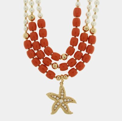 Collana in Metallo conchigla con sfere rosse e bianche BYS - gioiello BySimon