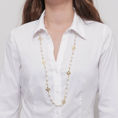 Metal necklace with flowers and pearls