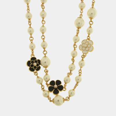 Collana in Metallo multifilo con sfere perlate e fiori smaltati bianchi e neri