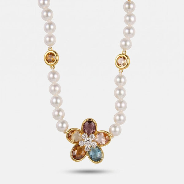 Collana in Metallo in metallo con filo di sfere lisce color avorio e pendente centrale a forma di fiore con petali in cristallo multicolore - BYSIMON gioielli
