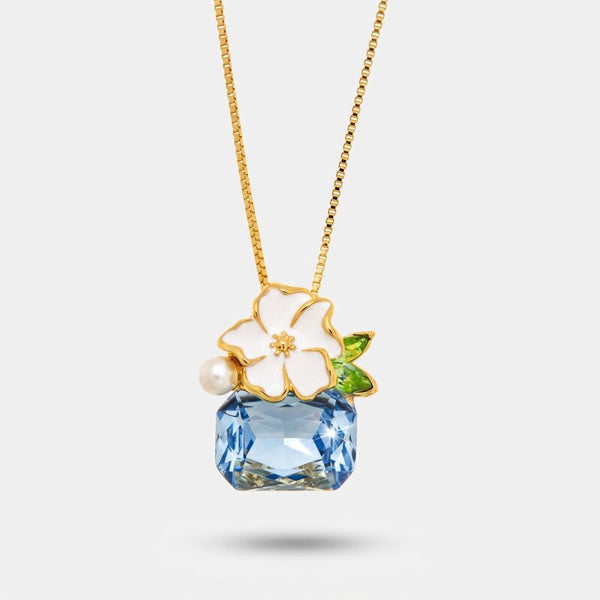 Collana in Metallo fiore bianco e cristallo azzurro - BYSIMON gioielli