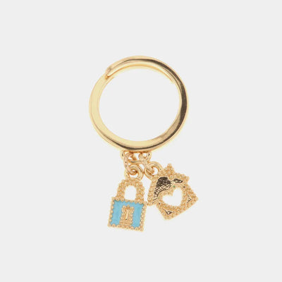 Anello in Metallo con pendenti impreziositi da smalti colorati a forma di lucchetto e casa con cuore