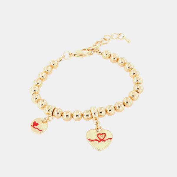Metal bracelet with sphere-link chain and red enamel heart pendants