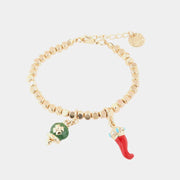 Bracciale in Metallo con ciondoli portafortuna, campanella smaltata verde e corno in smalto rosso - BYSIMON gioielli