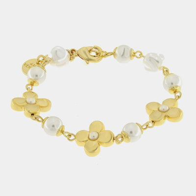 Metal bracelet with flowers and pearls