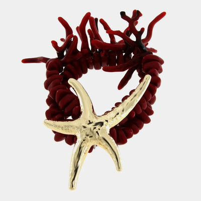 Bracciale in Metallo con pietre rosse e stella marina con rifinitura martellata