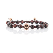 Bracciale in Acciaio con teschio centrale con zirconi neri e pietre marroni