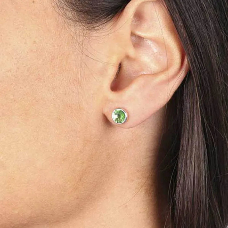 Orecchini in Argento 925  punto luce con cristalli colorazione verde