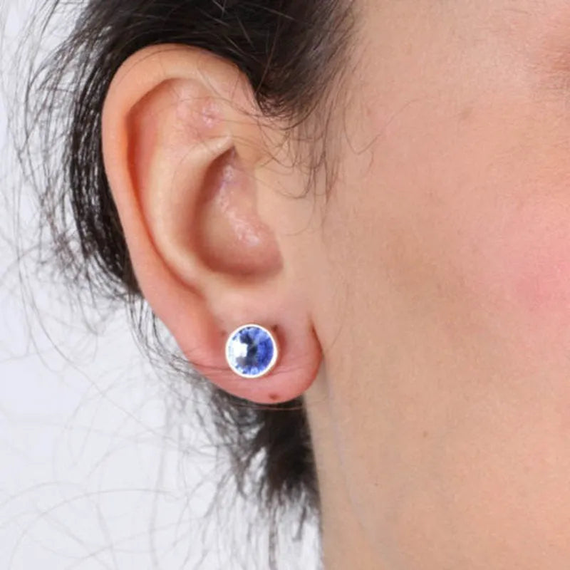 Sterling Silver stud earrings with denim blue crystals
