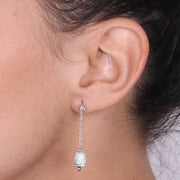Orecchini in Argento 925 con campanella pendente, impreziosita da luminosi zirconi bianchi