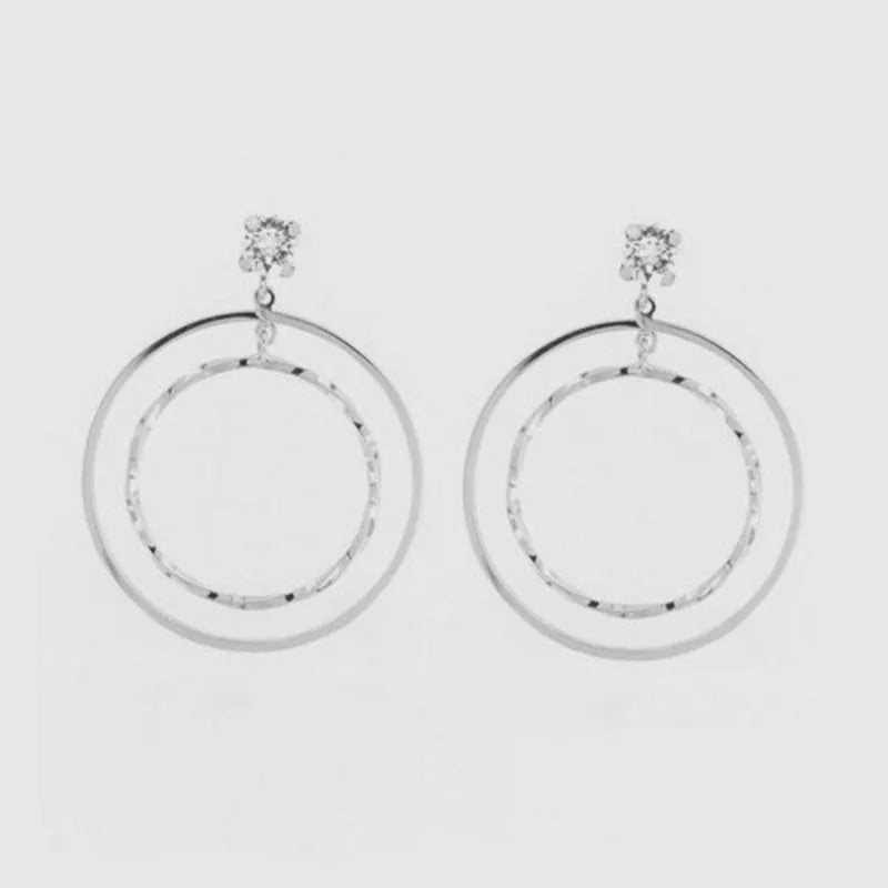 Orecchini in Argento 925 con pendenti a cerchio realizzati con lavorazione martellata e cristalli