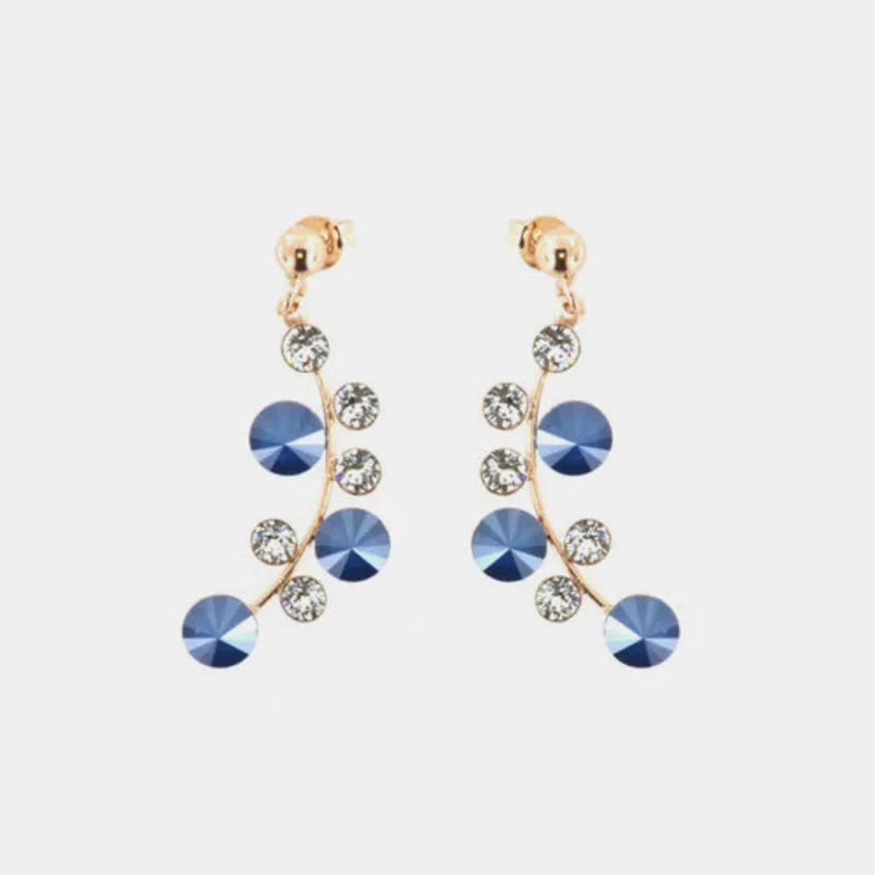 Orecchini in Argento 925  ad intreccio con cristalli colorazione royal blu, impreziosito da cristalli bianchi