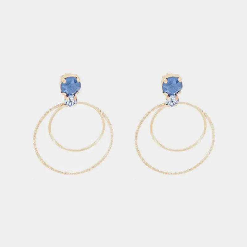 Orecchini in Argento 925 cerchi con cristalli blu al lobo.
