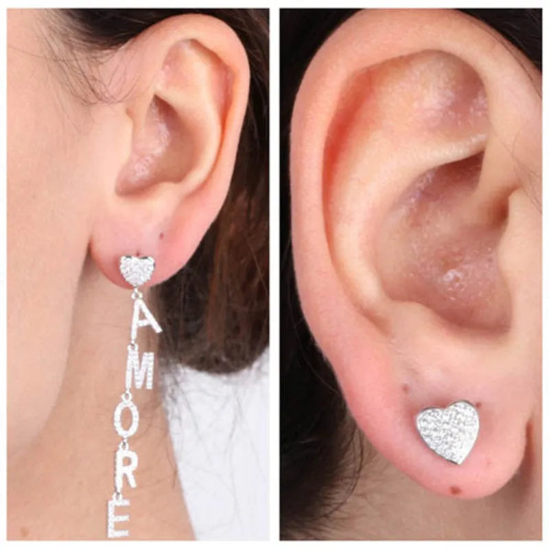 925 Sterling Silver stud earrings with heart and dangling "amore" inscription, embellished with white zircons
