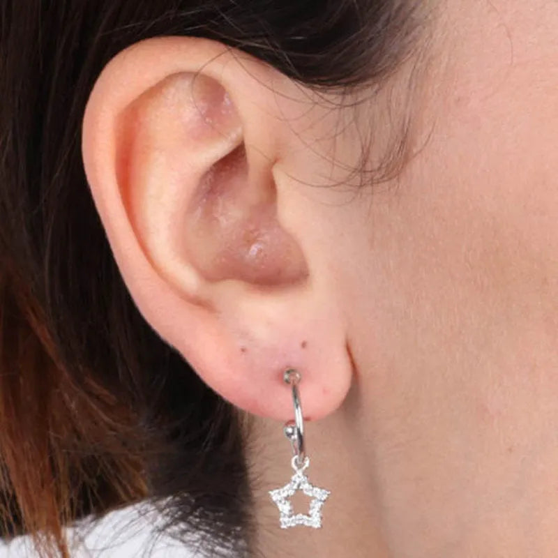 Sterling Silver 925 hoop earrings with dangling stars embellished with white zircons
