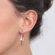 Orecchini in Argento 925 cerchi con scritta HAPPY interna, impreziosita da zirconi luminosi