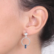 Orecchini in Argento 925  a cerchio con cristalli azzurri e bianco al lobo