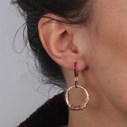 Orecchini in Argento 925 con cerchi pendenti impreziositi da intrecci di zirconi neri