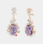 Orecchini in Argento 925 pendenti, con grande zircone viola centrale, impreziosito da zirconi bianchi