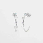 Orecchini in Argento 925 semicerchio con stelle impreziosito da cristalli colorati.