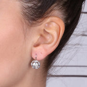 Orecchini in Argento 925 nodo con cristallo bianco centrale ed aggancio a monachina