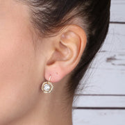 Orecchini in Argento 925 nodo con cristallo bianco centrale ed aggancio a monachina