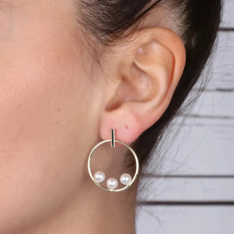 Orecchini in Argento 925 cerchio con trio di perla bianca