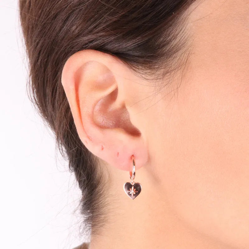 Earrings in 925 silver circles with heart pendant with central star