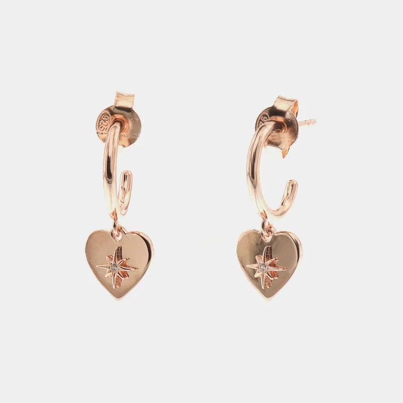Earrings in 925 silver circles with heart pendant with central star
