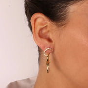 Orecchini in Argento 925 intrecchi con dettagli alternati di zirconi bianchi