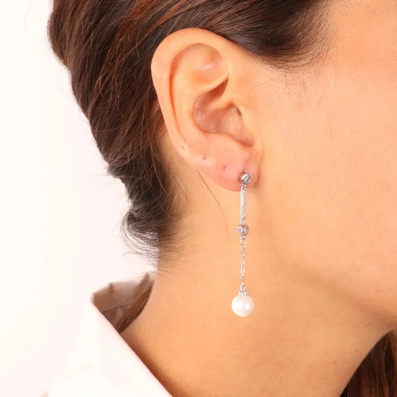Orecchini in Argento 925 con perle pendenti e zirconi bianchi