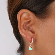 Orecchini in Argento 925 cerchietti impreziositi da zirconi bianchi e pendente a forma di lucchetto smaltato turchese