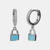 Orecchini in Argento 925 cerchietti impreziositi da zirconi bianchi e pendente a forma di lucchetto smaltato azzurro
