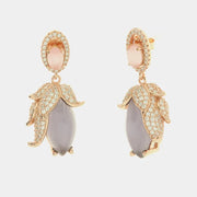 Orecchini in Argento 925 con pendente a forma di fiore impreziosita da pietra effetto occhio di gatto