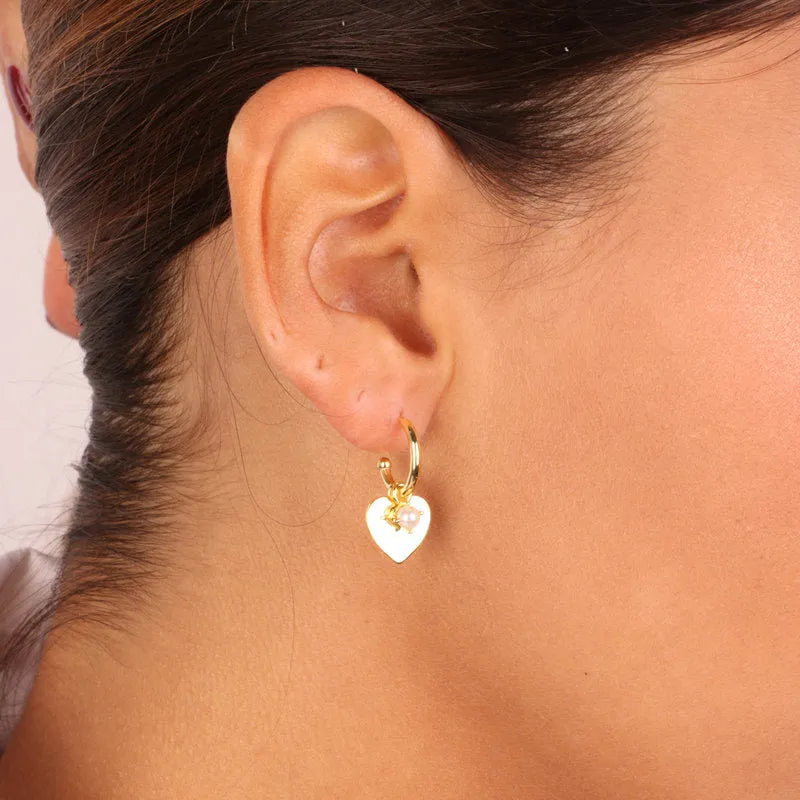 Earrings in 925 Silver circles with hanging heart and pearl