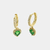 Orecchini in Argento 925 a cerchietto con chiusura a scatto tempestati da zirconi e cuore pendente in zircone verde