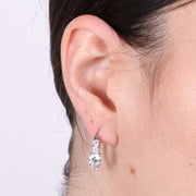 Orecchini in Argento 925 cerchietti con chiusura a scatto con zirconi bianchi