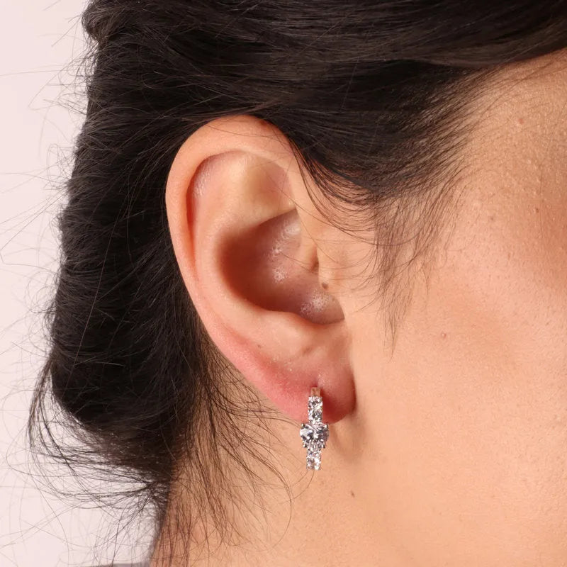 Earrings in 925 Silver circles with snap closure embellished with zircons