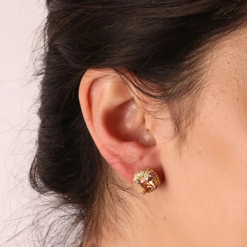 Orecchini in Argento 925 con zirconi bianchi e zircone centrale color champagne