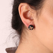 Orecchini in Argento 925 tempestati da zirconi neri e dettaglio centrale in zircone color champagne