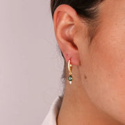 Orecchini in Argento 925 a cerchietto impreziosito da zirconi bianchi e zircone verde smeraldo pendente