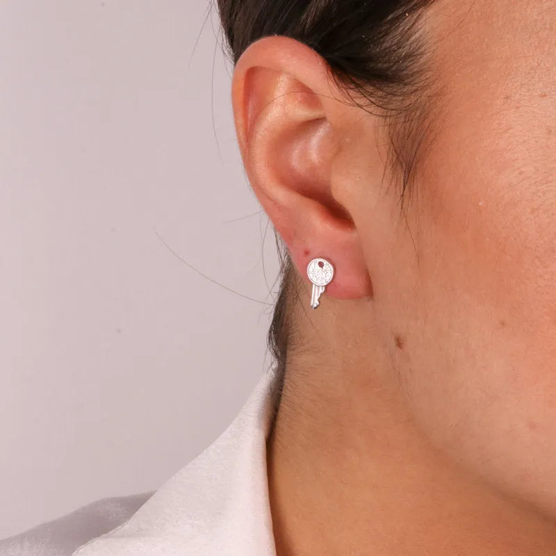 925 Silver lobe earrings with key embellished with white zircons